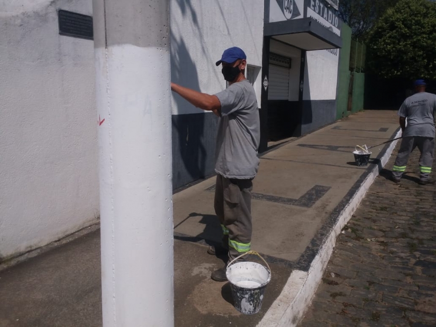 Limpeza e pintura de ruas em bairros